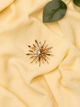 Radiant Starburst Crystal Brooch