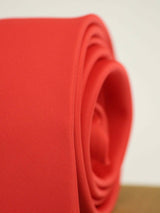 Apple Red solid necktie in woven microfiber, tied view