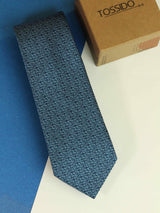 Blue abstract necktie in woven microfiber, flat lay