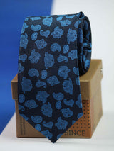 Blue paisley necktie in woven microfiber, flat lay