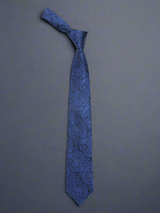 Blue paisley necktie in woven microfiber, flat lay