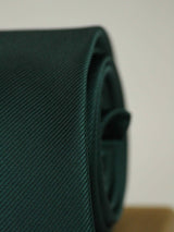 Dark Green solid necktie in woven microfiber, tied view