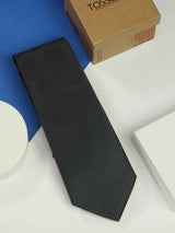 Dark Grey solid necktie in woven microfiber, tied view