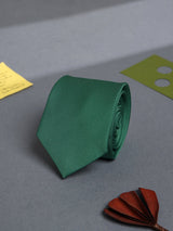 Green solid necktie in woven microfiber, close-up