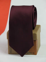 Maroon solid necktie in woven microfiber, flat lay