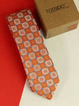 Orange geometric necktie in woven microfiber, flat lay