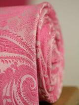 Pink paisley necktie in woven microfiber, tied view