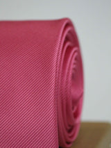 Pink solid necktie in woven microfiber, tied view