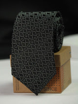 Black geometric necktie in woven microfiber, close-up