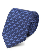 Blue geometric necktie in printed microfiber, close-up