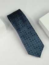 Blue geometric necktie in woven microfiber, flat lay