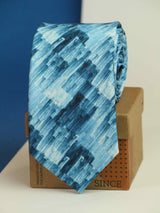 Blue abstract necktie in printed microfiber, flat lay