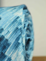 Blue abstract necktie in printed microfiber, tied view