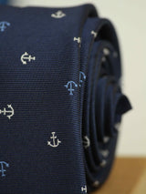 Blue anchor necktie in woven microfiber, tied view