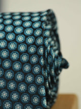 Blue floral necktie in woven microfiber, tied view