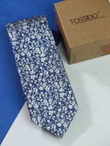 Blue floral necktie in woven microfiber, flat lay
