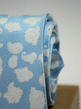 Blue paisley necktie in woven microfiber, tied view