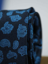 Blue paisley necktie in woven microfiber, tied view