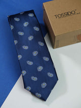 Blue paisley necktie in woven microfiber, flat lay