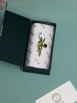 White Enamel Rose Bud Brooch