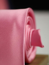 Glossy Pink solid necktie in woven microfiber, tied view