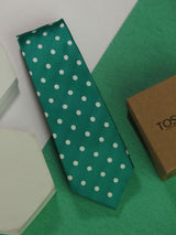 Green polka necktie in woven microfiber, close-up