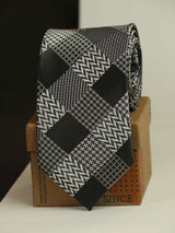 Grey check necktie in woven microfiber, close-up