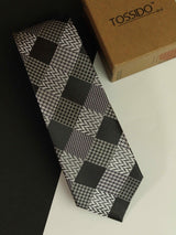 Grey check necktie in woven microfiber, flat lay