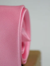 Light Pink solid necktie in woven microfiber, tied view