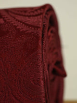 Maroon paisley necktie in woven microfiber, tied view