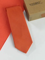 Orange solid necktie in woven microfiber, flat lay