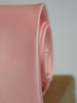 Peach solid necktie in woven microfiber, tied view