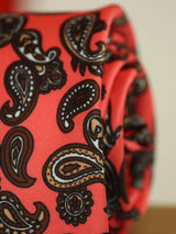 Pink paisley necktie in printed microfiber, tied view