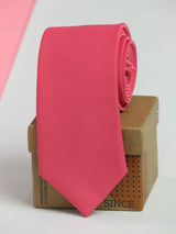 Pink solid necktie in woven microfiber, close-up