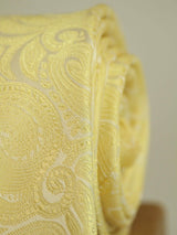 Yellow paisley necktie in woven microfiber, tied view